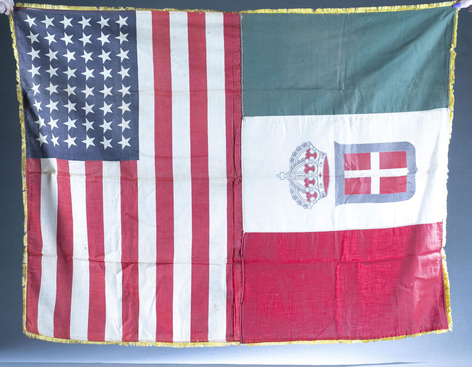 Interwar U.S. and Italy friendship linen flag: A Interwar U.S. and Kingdom of Italy friendship linen flag, Circa 1912-1946. 48 Star U.S. flag over Kingdom of Italy with arms of Savoy. 44 1/2" x 34"