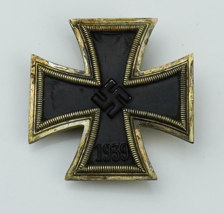 WWII German Named Iron Cross 1st Class: A WWII German Named Iron Cross 1st Class hinging pin medal. Named "Felix Steiner/ 30/10/1944." Condition: Damage on top of black field.
