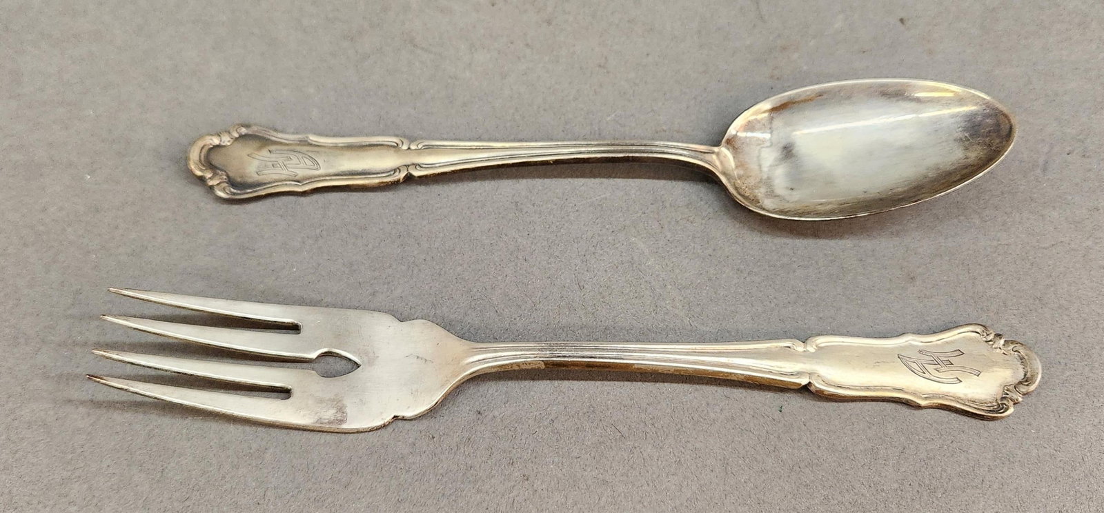 WWII German Adolf Hitler silver spoon & fork: A WWII German Adolf Hitler 800 silver spoon and salad fork. "AH" monogram. M.H. Wilkens & Sohne maker marks. 2.97 ozt. 7" and 7 1/8"