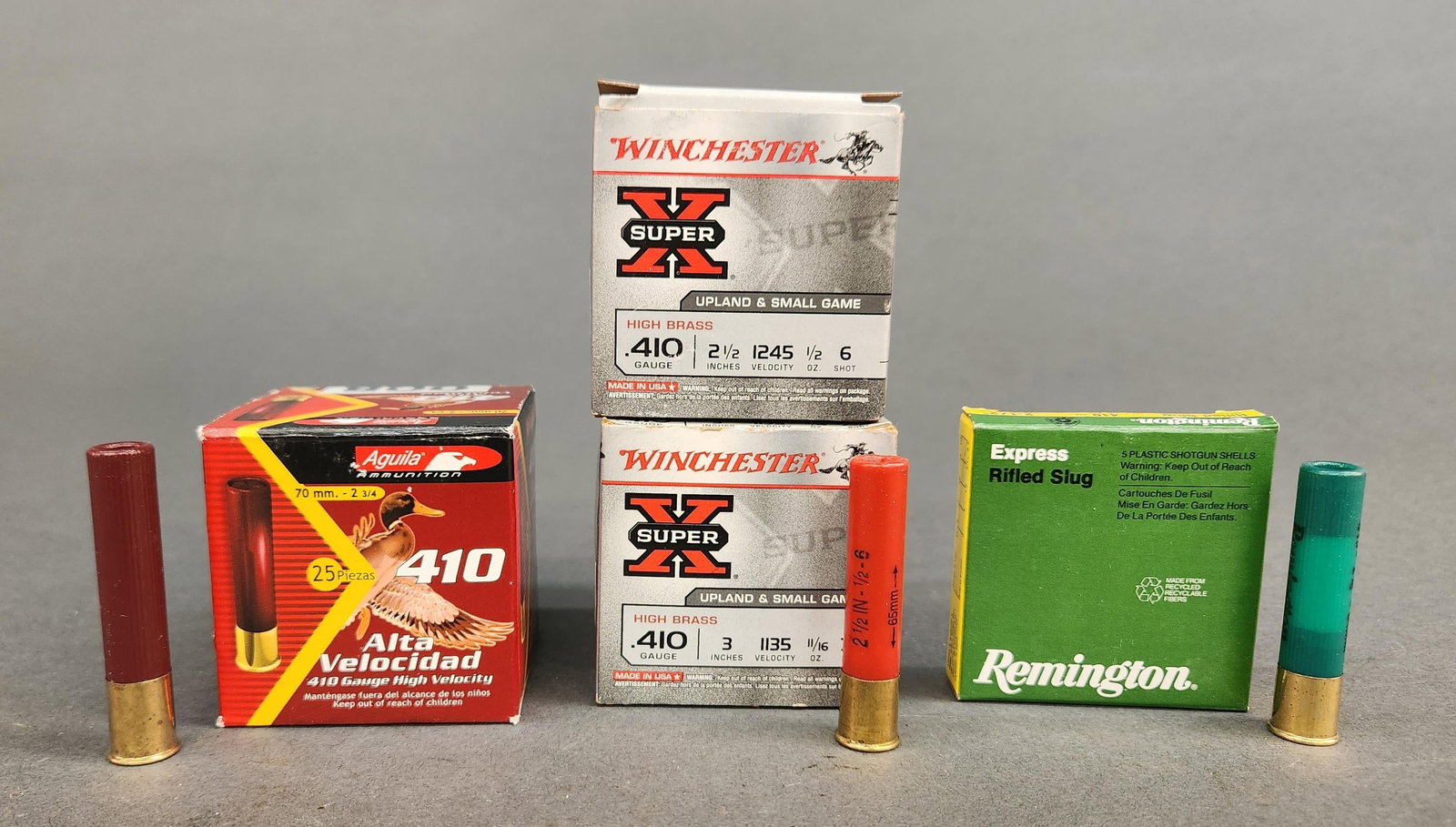 .410 shot shells, 80 rounds: A group of .410 shot shells, 80 rounds. ++ 1 box of 25 rounds Winchester Super X 3" shells #7 1/2 shot. ++ 1 box of 25 rounds Winchester Super X 2 1/2" shells, #7 1/2 shot. ++ 1 box of 25 rounds Aguil