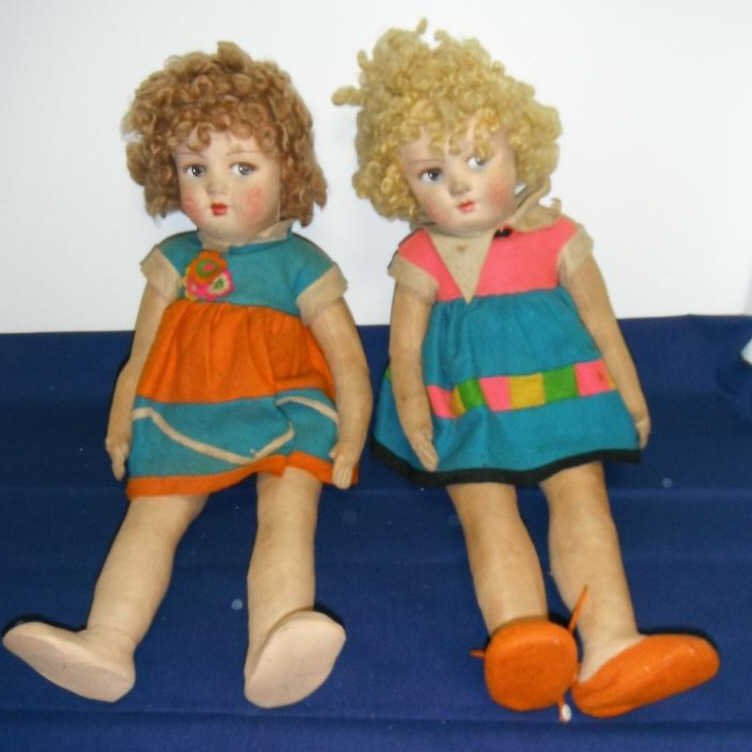 Pair of Lenci dolls, possibly Shirley Temple.: Pair of Lenci dolls, possibly Shirley Temple.Felt dresses. 22-23".