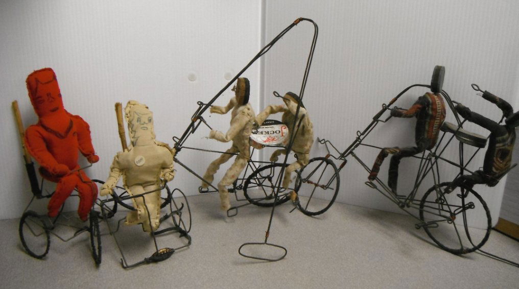 4 wire pull toys with figures incl 1 devil figure: 4 wire pull toys with figures incl 1 devil figure.Also 2 tandem bicycle toys. Handmade.