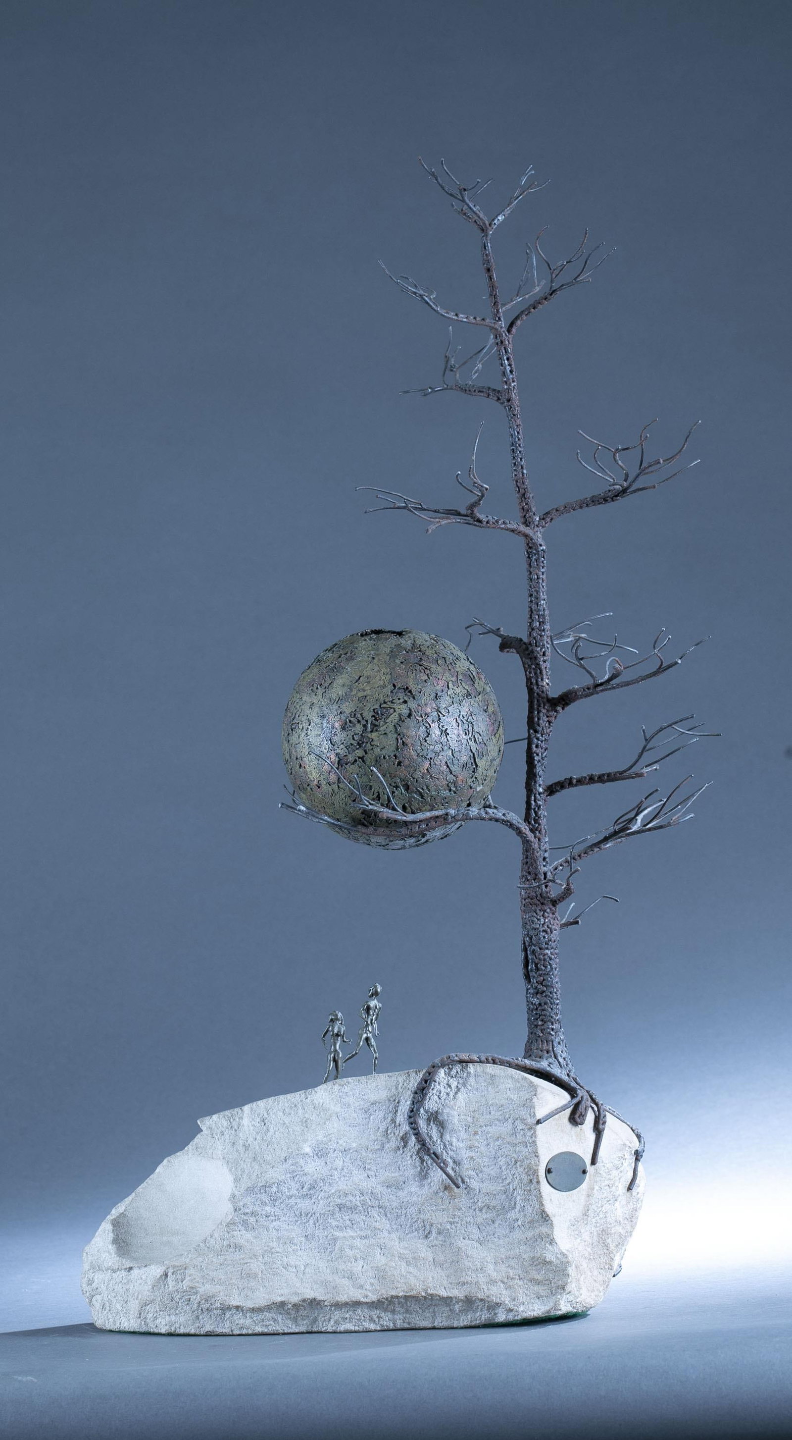 Richard Martin, "Before the Crack of Dawn," 1978.: Richard A. Martin. "Before the Crack of Dawn." 1978. Metal and stone sculpture. Signed, titled, and dated on plaque on side. 30" x 15".