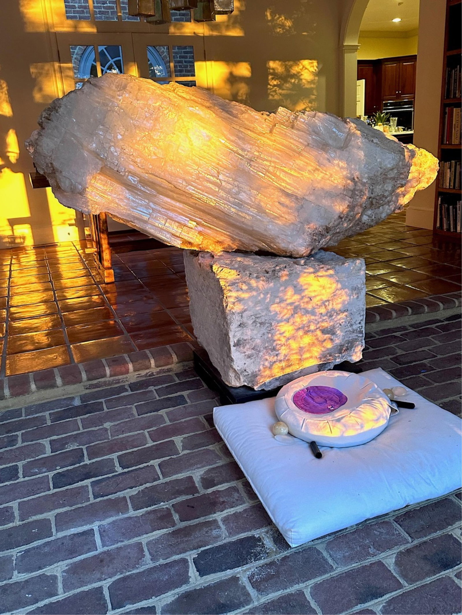 Large selenite crystal cluster on limestone base.: A large healing selenite crystal cluster on a Texas limestone base. Crystal: 73" x 18" x 26". Base: 20" x 25" x 24". Selenite Crystals on the Metaphysical Community are known as one of the most import