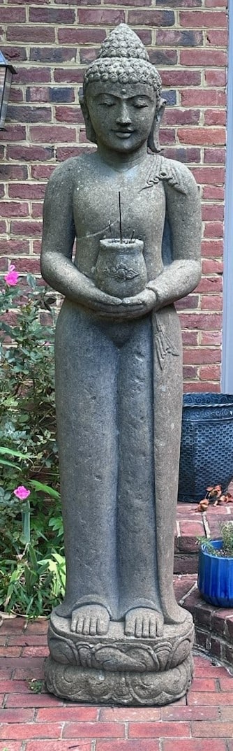 Large lava stone rock Theravada buddha.: A large lava rock Theravada buddha statue holding alms bowl. Hand carved in Bali. Purchased 25 years ago. 85" x 19" x 12". Approximately 500lbs.