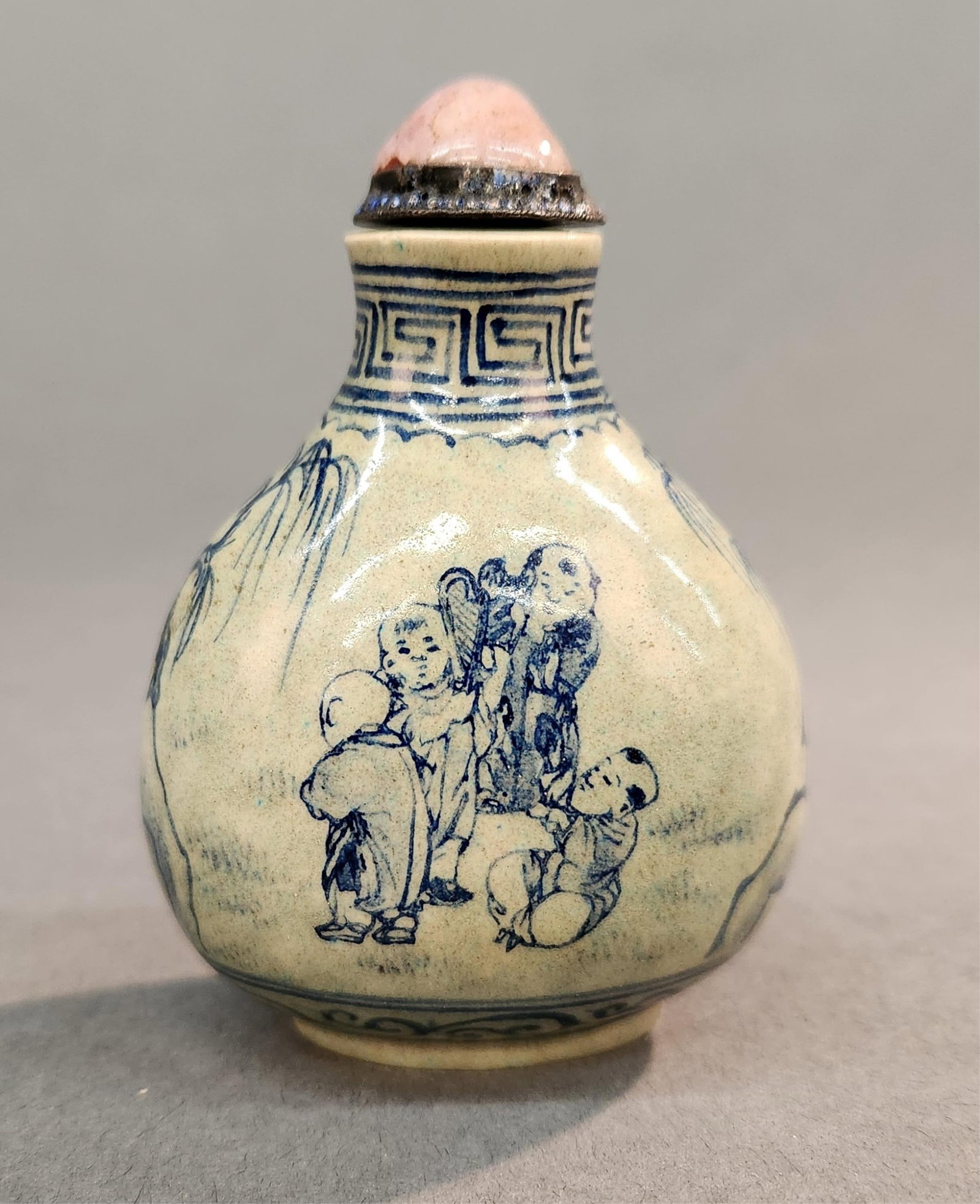 Chinese blue and white porcelain snuff bottle.: A Chinese blue and white porcelain snuff bottle. 3" x 2 1/4" x 1 1/2".