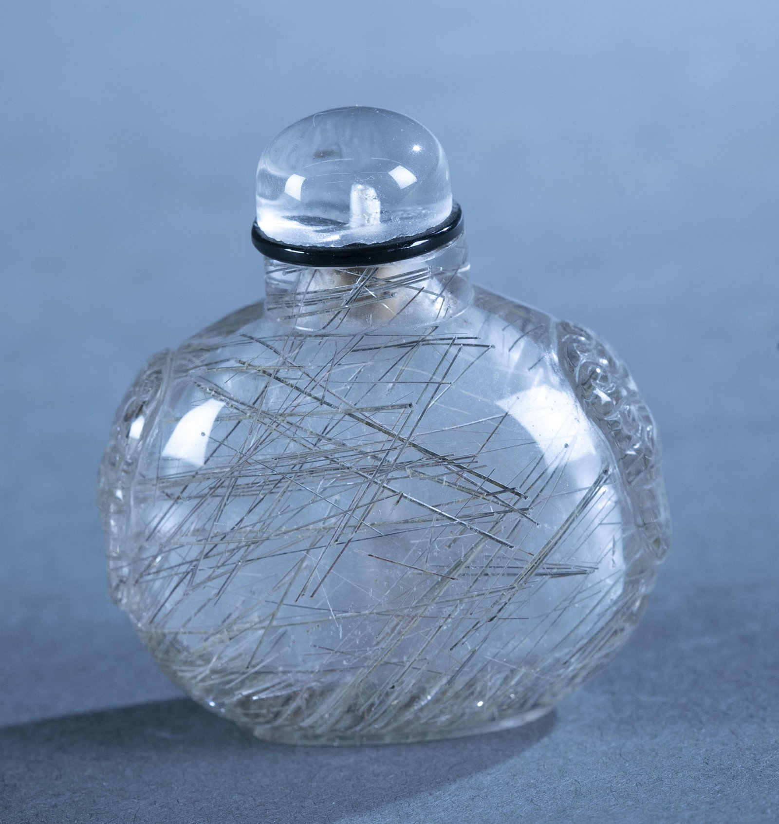 Chinese hair crystal snuff bottle.: A Chinese hair crystal snuff bottle. 2" x 1.8" x 1".