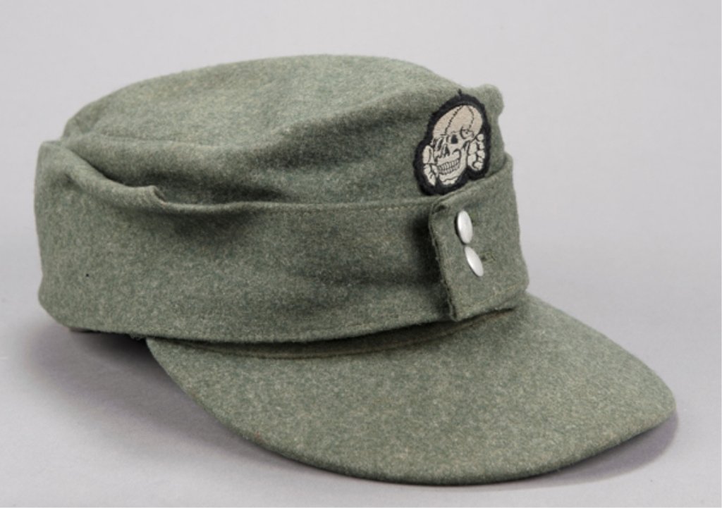 German WWII Wool SS M43 field cap. Silver skull ins: Silver skull insignia on front.