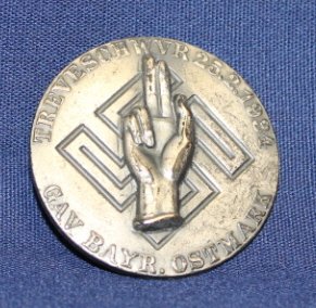 German WWII GAU 1934 Loyalty Day badge. B-29 Silve: B-29 Silvered "GAU. BAYR. OSTMARK…25.2.1934" Darkened patina.