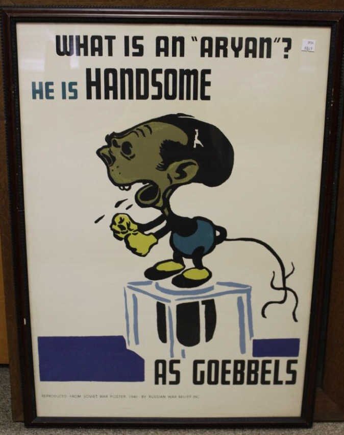 WWII propoganda poster w/ Goebbels. 1941 silkscree: 1941 silkscreen. "What Is An Aryan? He Is Handsome as Goebbels" by Boris Efimovich Efimov. Bottom left reads "Reproduced from Soviet War Poster 1941 by Russian War Relief Inc". Russian war poster repr