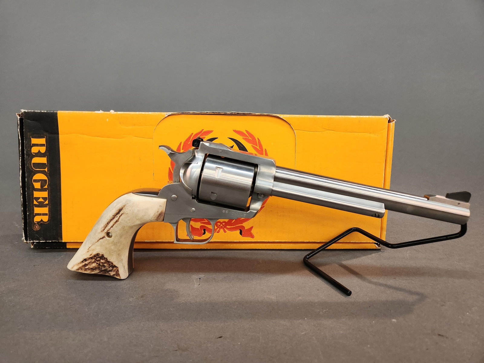 Ruger New Model Super Blackhawk revolver, .44 mag: A Strum, Ruger and Co. New Model Super Blackhawk double action revolver, .44 magnum. Stainless steel finish. 7 1/2" barrel. Ramp front sight and adjustable rear sight. Antler grips. Serial 85-15***. I