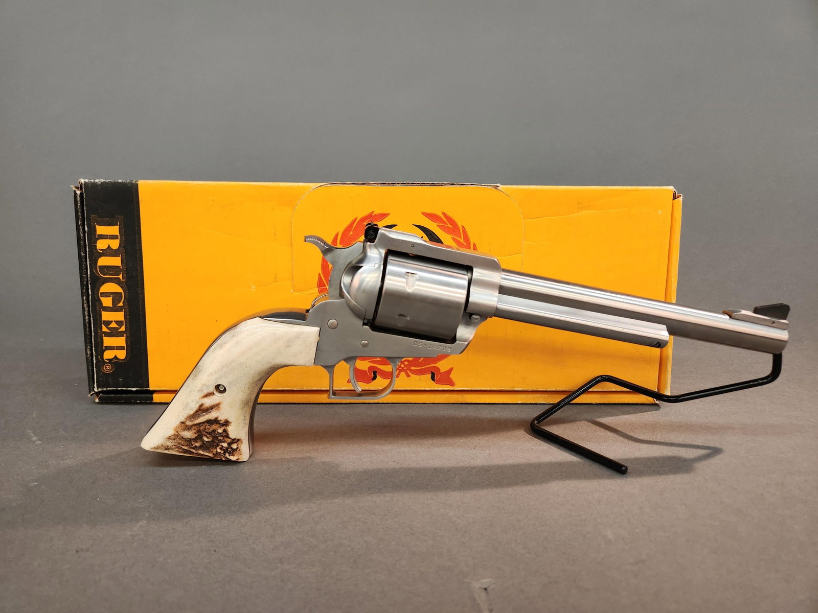 Ruger New Model Super Blackhawk revolver, .44 mag: A Strum, Ruger and Co. New Model Super Blackhawk double action revolver, .44 magnum. Stainless steel finish. 7 1/2" barrel. Ramp front sight and adjustable rear sight. Antler grips. Serial 85-14***. I