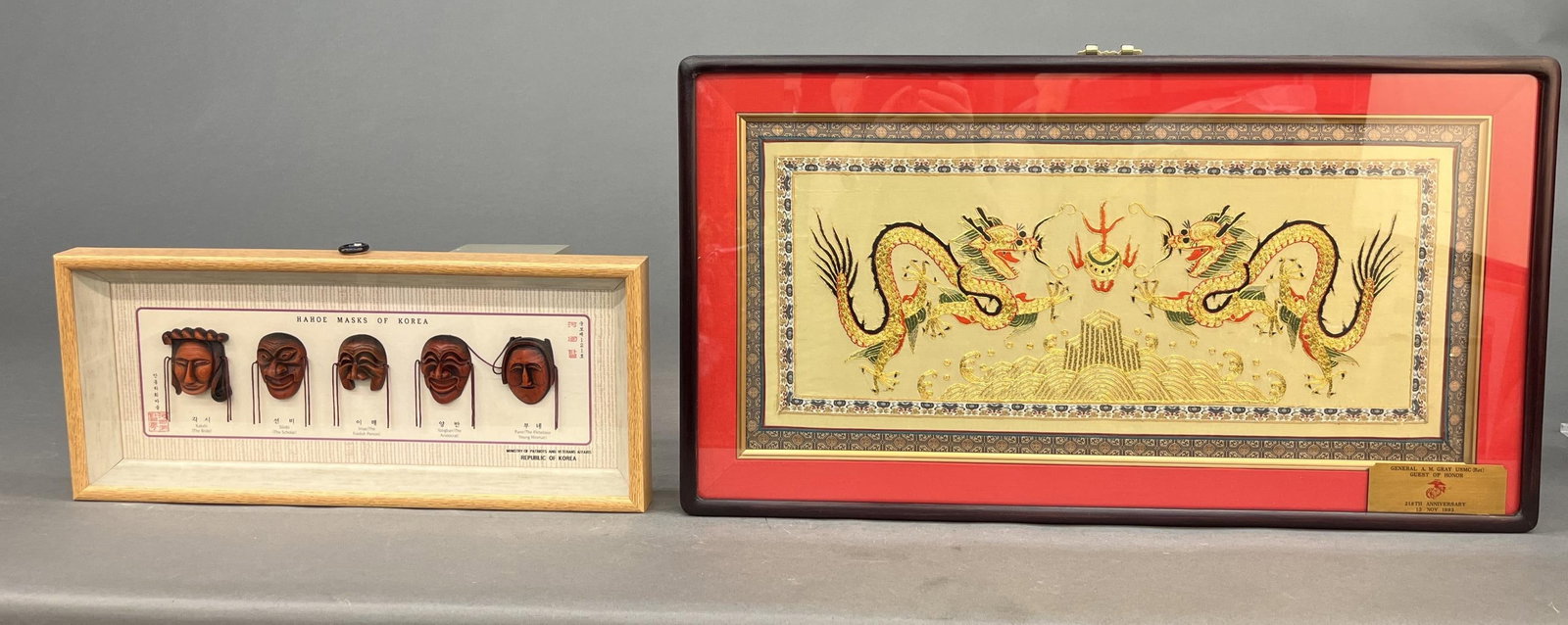 Gen. Gray Hahoe masks and embroidered silk.: A group of framed items from the Republic of Korea for General Alfred M. Gray Jr. Includes five Hahoe masks from the Ministry of Patriots and Veterans Affairs and an embroidered silk. Largest: 15 1/4"