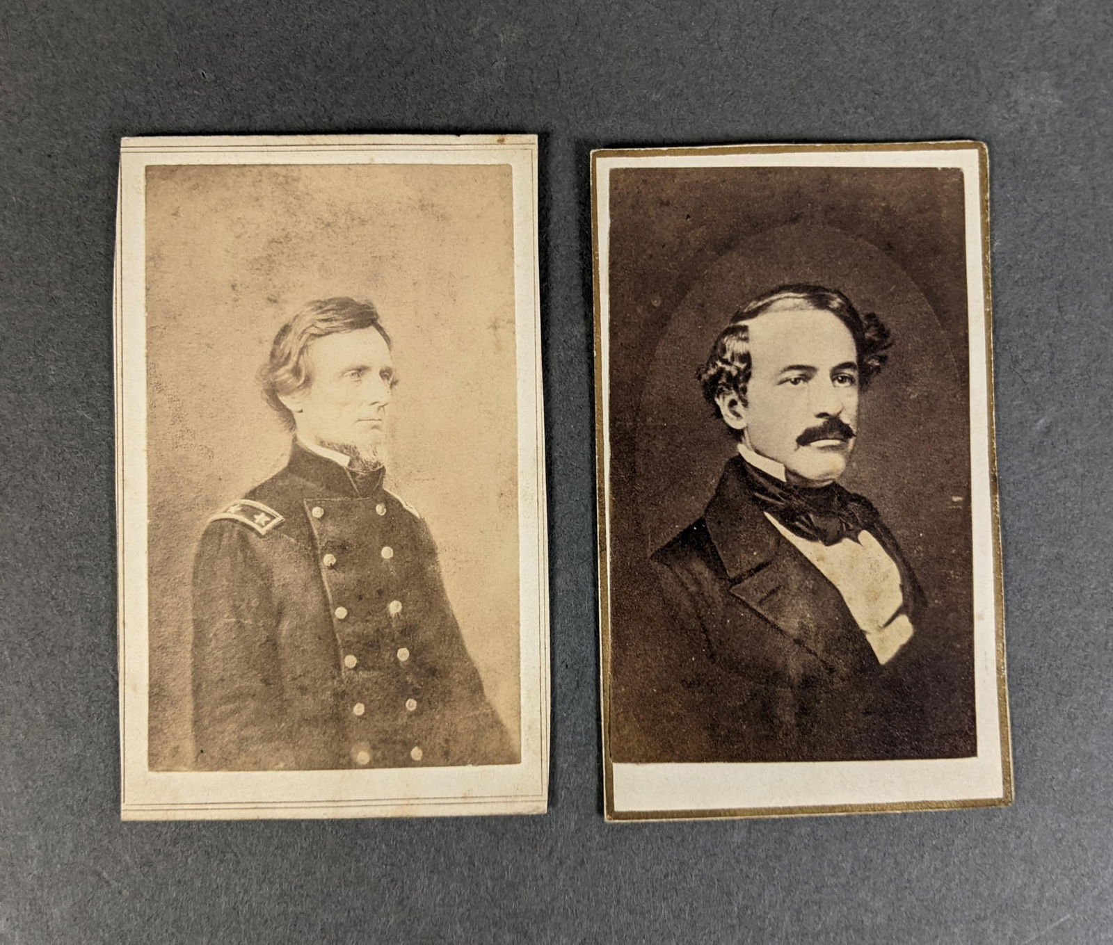 Jefferson Davis and Robert E. Lee CDVs.: [Photography] 2 Carte de Visite of Lee and Davis. (1) Jefferson Davis CDV after James E. McClees portrait of 1858, with Jefferson dress in a Major General's uniform. J.H. Bigelow, 212 Broadway, New Yo