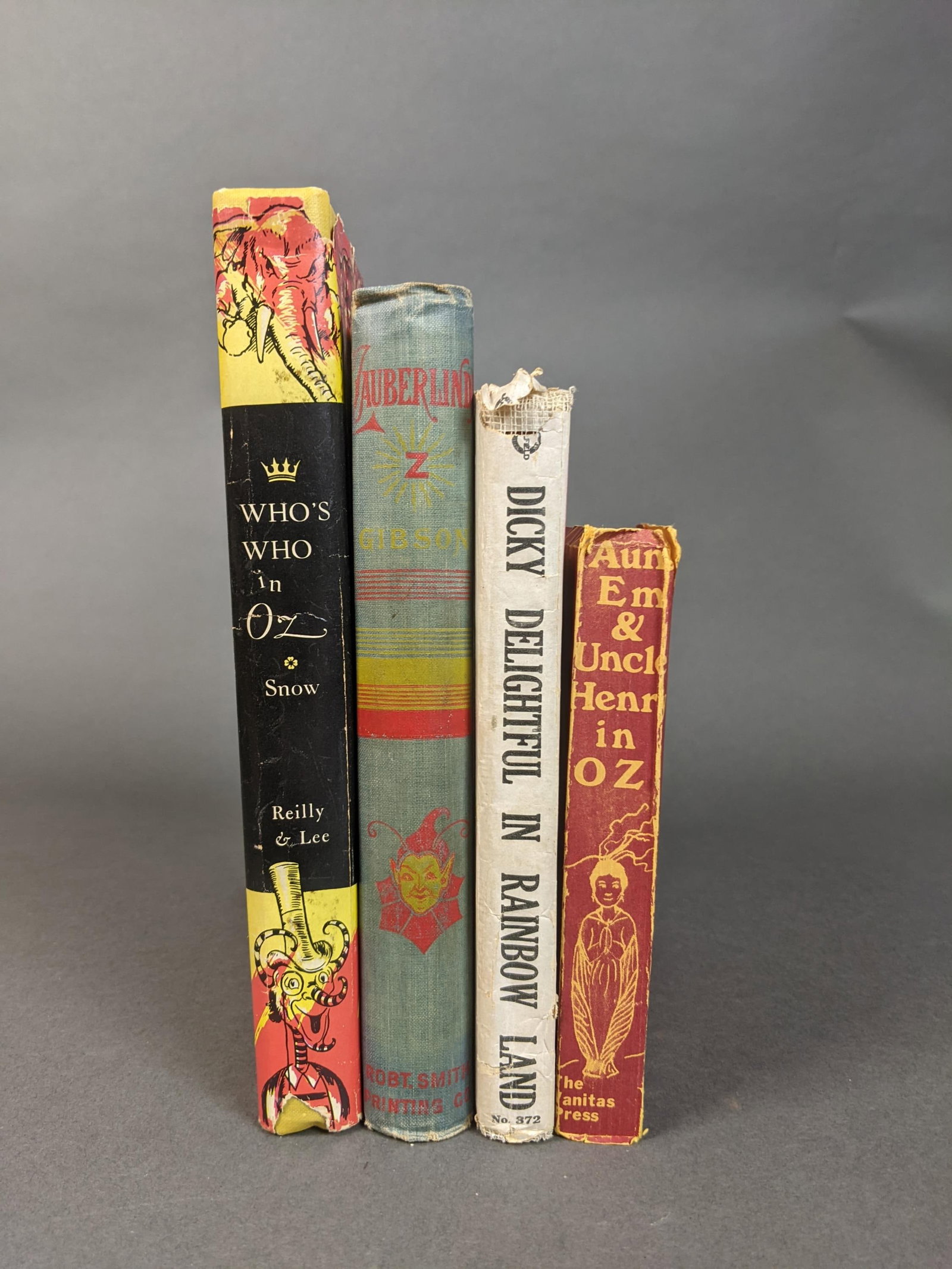 Who's Who in Oz: [Childrens] 4 titles. (1) Snow, Jack. Who's Who in Oz. Reilly & Lee, Chicago, 1954. 8vo. Hardcover and dust jacket. This well-illustrated dictionary of oz characters from all 39 books was advertised a