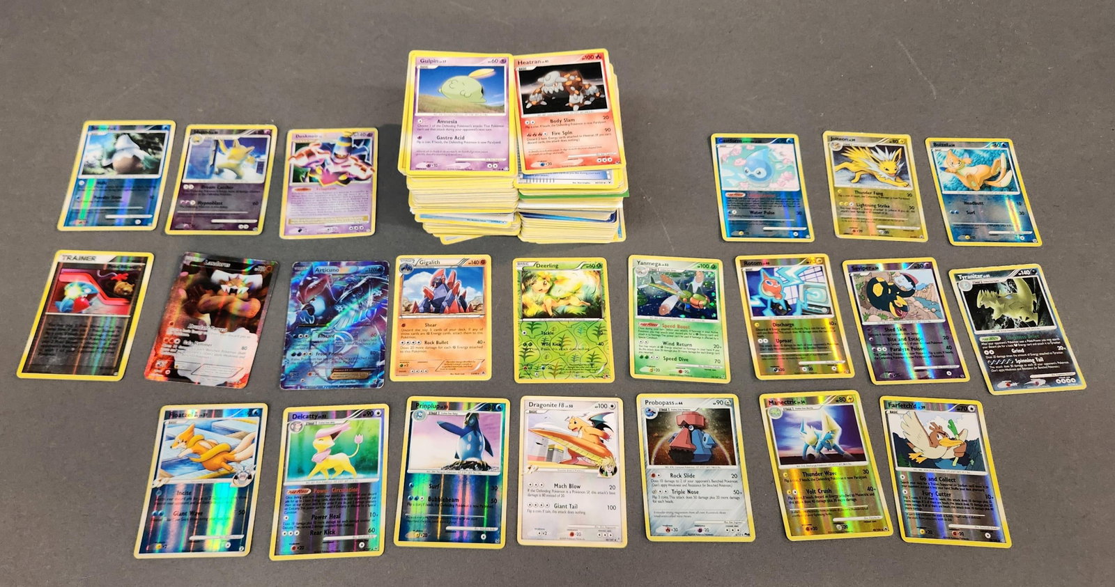 2008-1012 Pokemon cards: A group of Pokemon cards, 2008-1012. Approximately 350 cards and 100 energies. Including #96 "Dusknoir LV. X" Stormfront, #23 "Jolteon" [Reverse Holo] Majestic Dawn, #49 "Castform Rain Form" [Reverse 