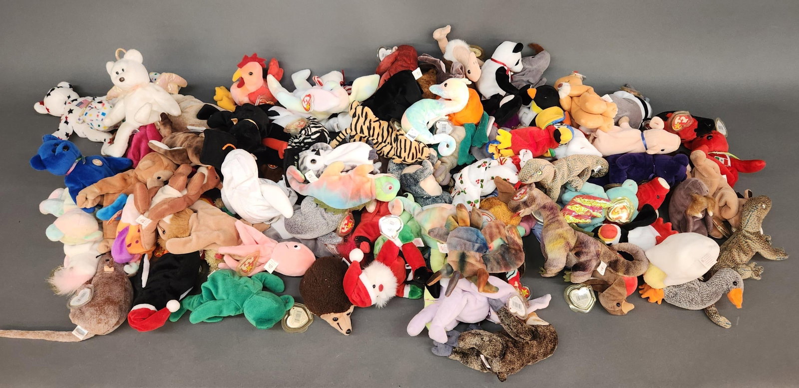 85 TY Beanie Babies with PE pellets: A group of approximately 85 TY Beanie Babies with PE pellets. Majority have hang tags.