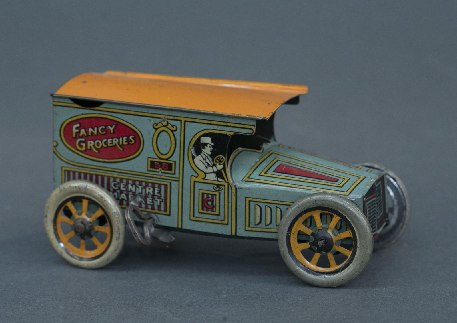 J. Chein tin litho wind up "Fancy Groceries" toy (1 of 4)