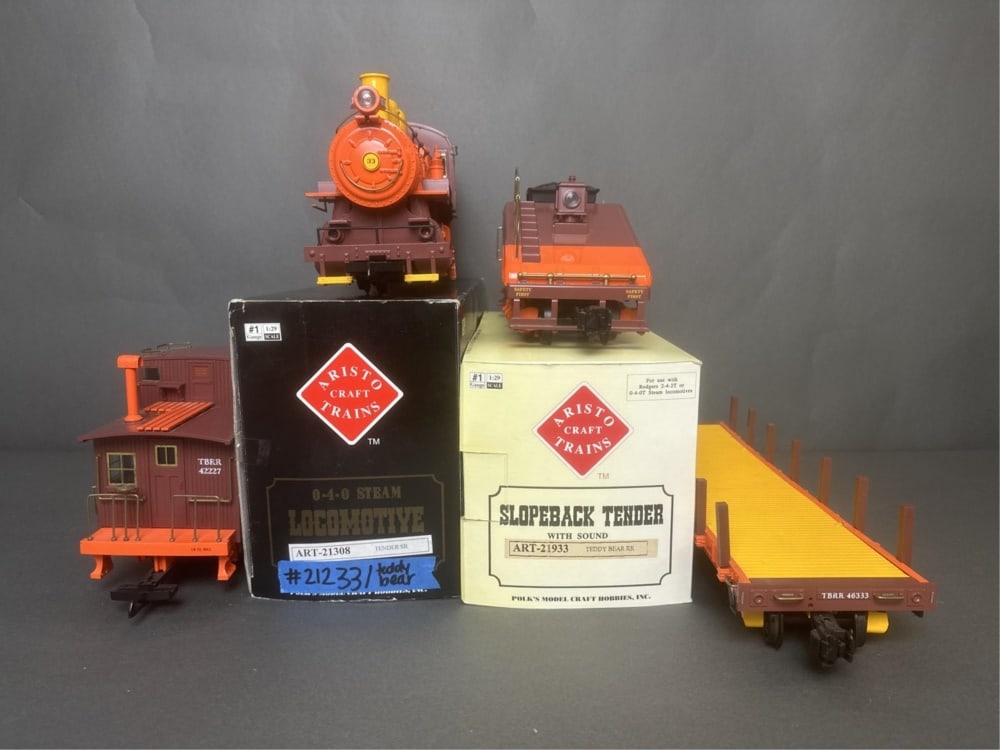 Aristo Craft - Teddy Bear RR - locomotive (21233),: Aristo Craft - Teddy Bear RR - locomotive (21233), tender (21933), flat bed (46333), and caboose (42227) Only 2 items come with boxes (locomotive box is not the original box); locomotive tested: F/B, 