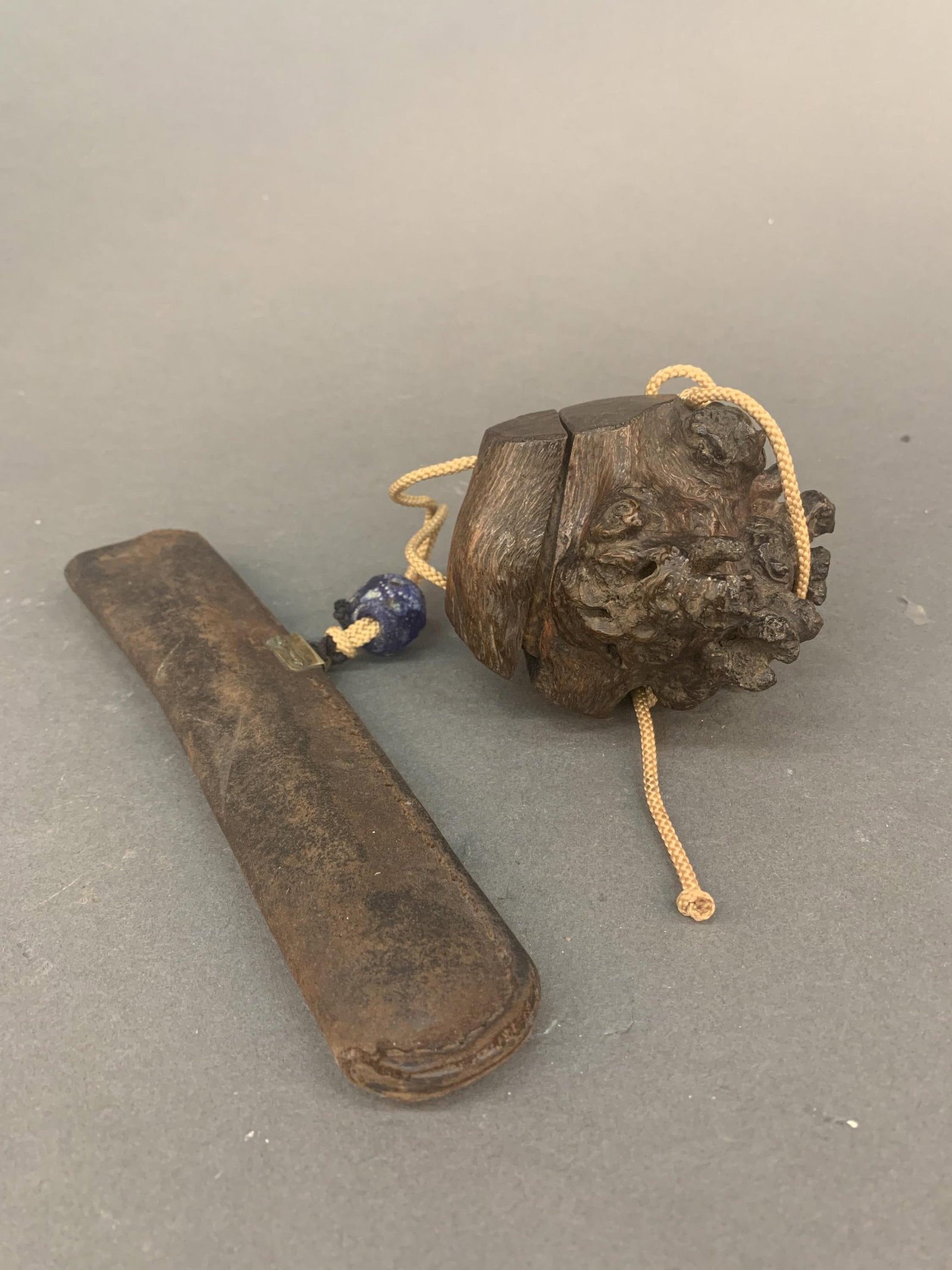 Japanese inro and Kiseru pipe case.: A Japanese root ball inro with glass ojime and leather case with silver and bamboo Kiseru pipe. 11" overall. Inro: 4" x 3".
