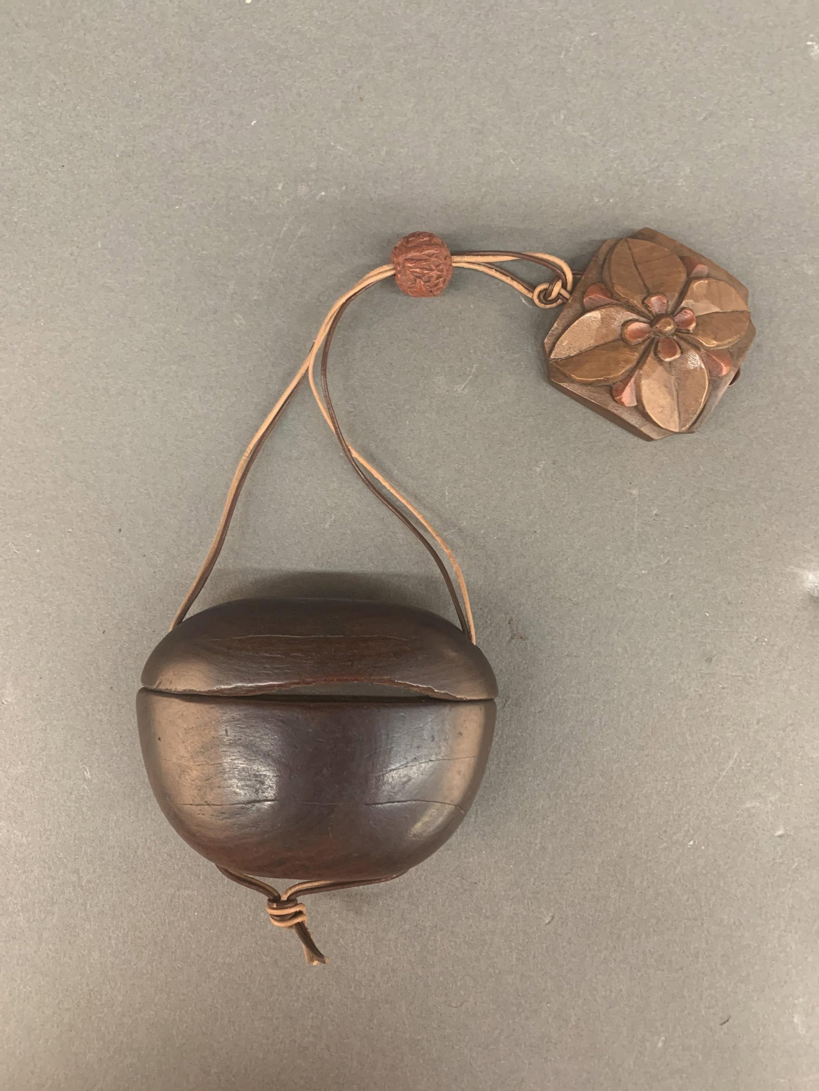 Japanese wood inro with netsuke and ojime.: A Japanese wood carved inro with netsuke and ojime. 10 1/2" x 3 1/2" x 1".