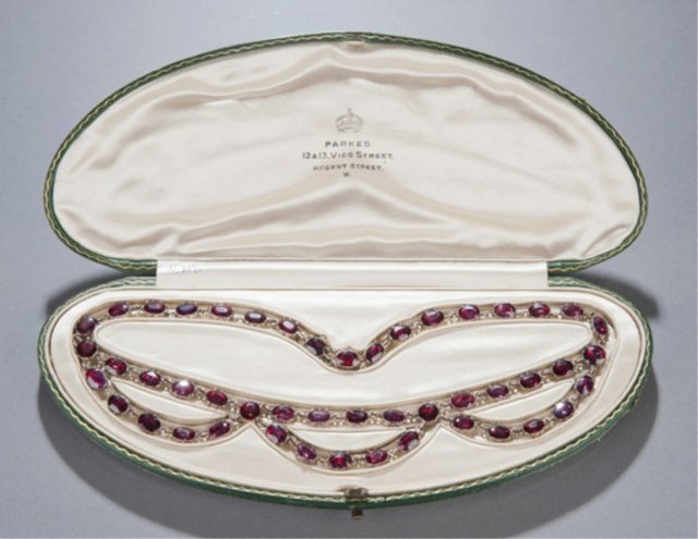 19th c ruby necklace set in gold.: A 19th c ruby necklace set in gold. 48 rubies set in gold. Original fitted box. Late 19th century. 16"l. Tw 0.92 t oz.