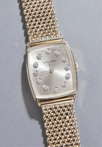 Longines-Wittnauer 14KT gold man's wrist watch.: A Longines-Wittnauer 14KT gold man's wrist watch. 12 diamonds , 0.26 TCW. Adjustable 7.5-8 1/5". c.1955.