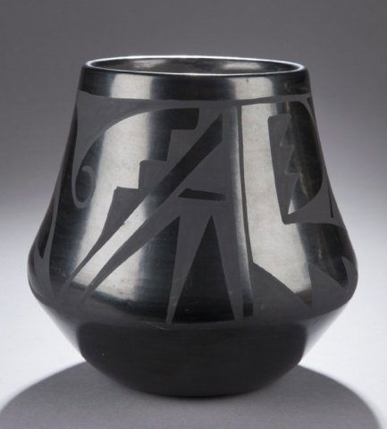 Carlos & Carmelita Dunlap San Ildefonso pot.: A Carlos & Carmelita Dunlap San Ildefonso pot. Signed "Carlos & Carmelita Dunlap". 7"h x 7"d.