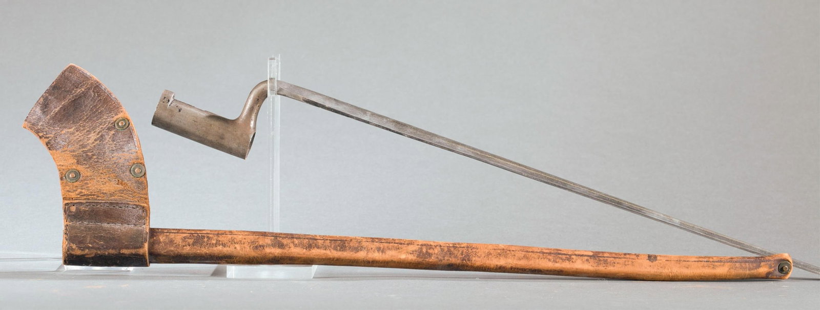 U.S. M1816 socket bayonet with sheath: A U.S. Model 1816 socket bayonet with sheath. 15 3/4" blade. marked on ricasso "US." 18 3/4" overall. Condition: Heavy wear to sheath with splitting stitches.