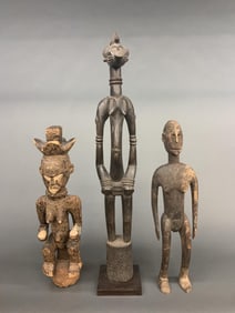3 West African figures.