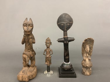 4 West African figures.