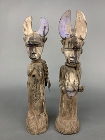 2 West African figures.
