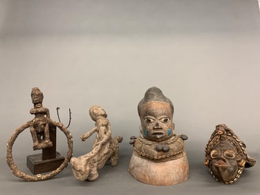 4 African figural objects.