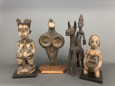 4 African figures.