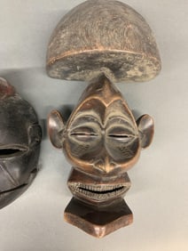 4 African masks.