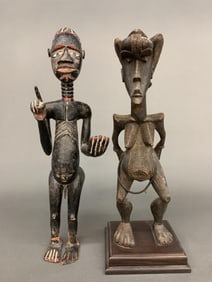 2 African style figures.