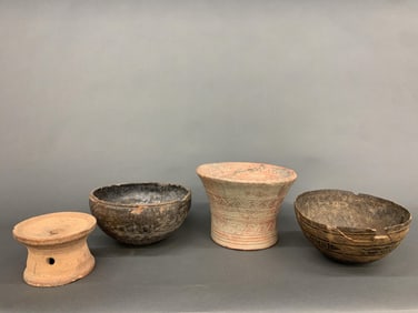 4 Ethnographic stools and vessels.