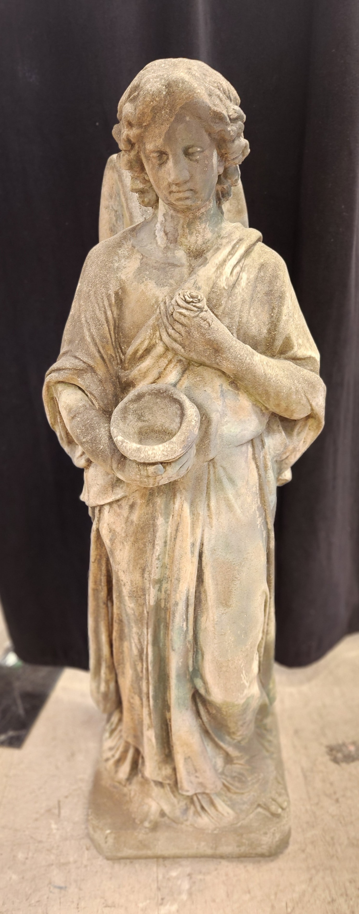 Concrete garden angel sculpture. (1 of 3)