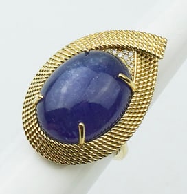 18KYG Tanzanite & Diamond Ring.
