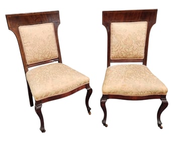 2 Walnut side chairs.