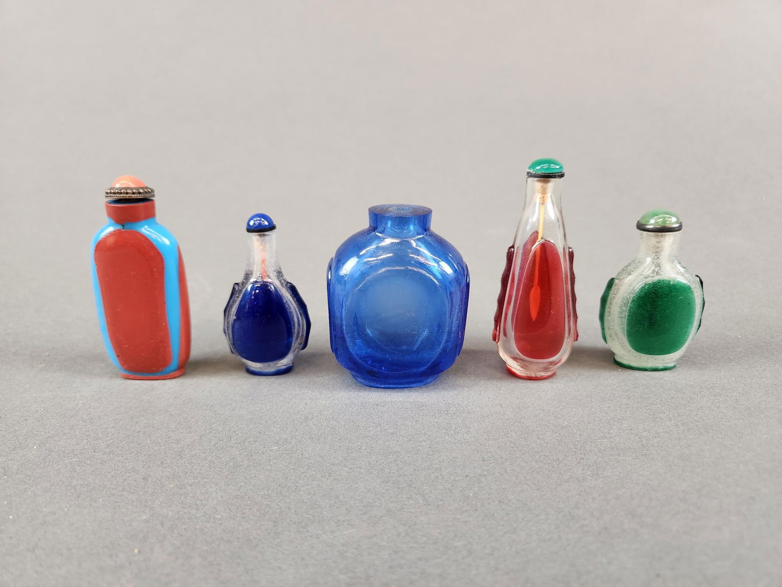 5 Glass snuff bottles. (1 of 2)