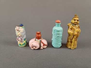 4 Ceramic snuff bottles.