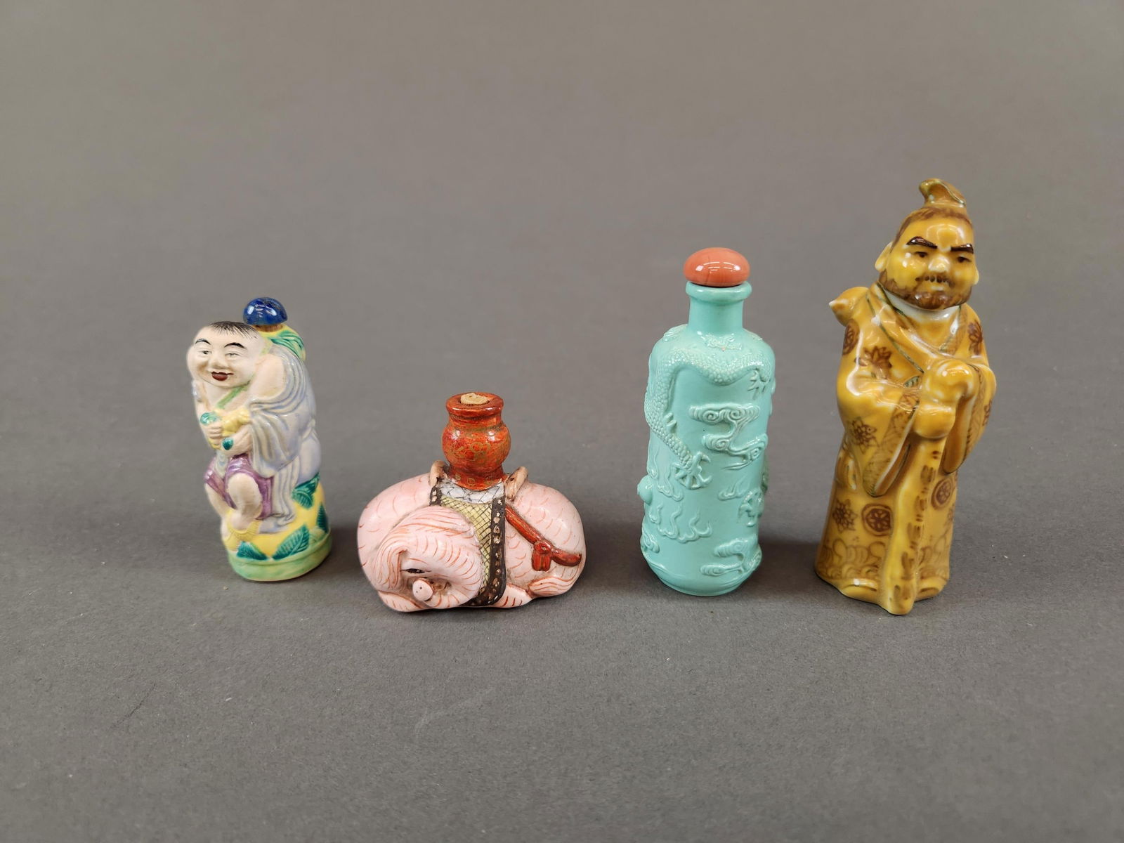 4 Ceramic snuff bottles. (1 of 3)
