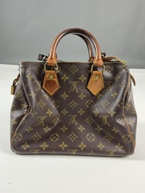 Louis Vuitton style monogram Speedy 25 handbag.