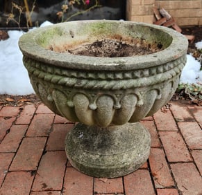 Footed concrete planter
