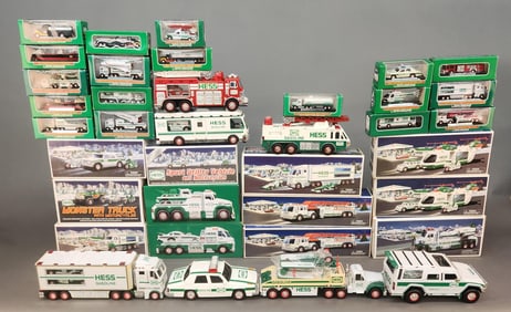 17 Hess Trucks and 20 Hess miniatures