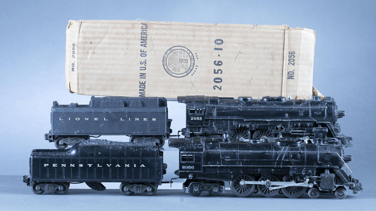 Postwar Lionel O Gauge #2056 & #2055 engine: A Postwar Lionel O Gauge No. 2056 Hudson Type 4-6-4 locomotive with box and No. 2045W-50 tender and No. 2055 Hudson Type 4-6-4 locomotive with 6026W tender. Condition: C4-5. Untested.