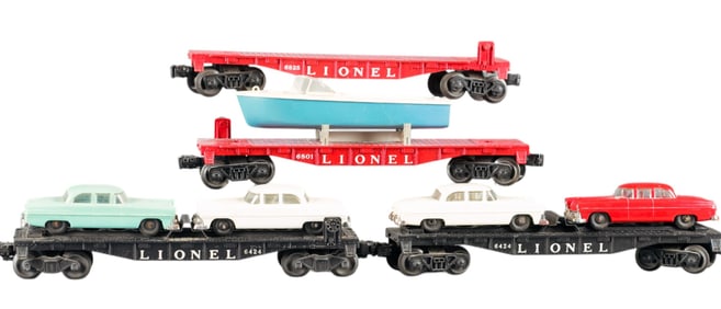 4 Postwar Lionel flatbed cars