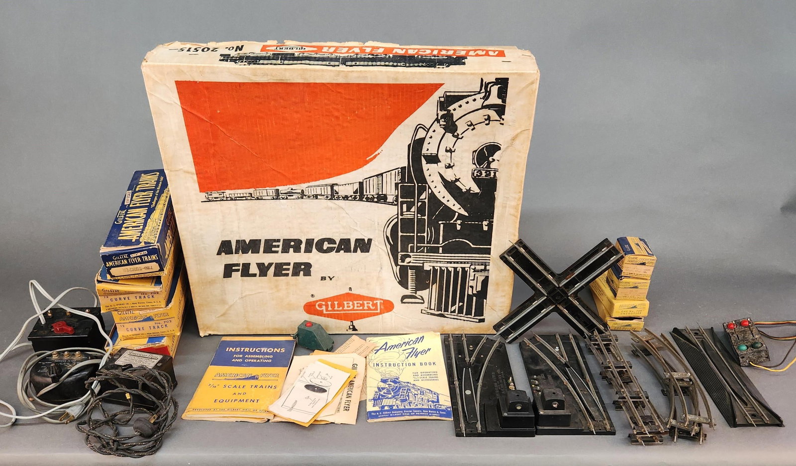 S Scale track, switches, and accessories: A group of S Scale track, switches, and accessories. ++ Large group of S Scale tracks, including two boxes for American Flyer No. 702 curved track and one No. 700 for straight track.