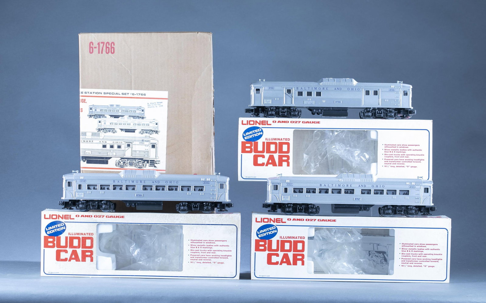 1977 Lionel 6-1766 Budd B&O Service Station set: A 1977 Lionel MPC No. 6-1766 Budd Baltimore & Ohio Service Station passenger car. In original boxes and shipping box. Condition: C10. Graffiti on top of shipping box. Foxing on car boxes.